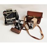SELECTION OF PHOTOGRAPHIC CAMERAS including a cased Polaroid Automatic 330 Land Camera, a cased