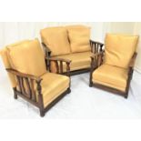 20TH CENTURY OAK SUITE comprising a two seat sofa and two armchairs, all with shaped backs and