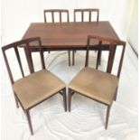 TEAK DRAW LEAF DINING TABLE AND CHAIRS the table with an oblong extending top, standing on