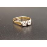DIAMOND TWO STONE RING the two round brilliant cut diamonds totaling approximately 0.3cts, on