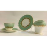 AYNSLEY TEA SERVICE decorated in the Sherwood pattern and comprising tea cups, saucers, milk jug,