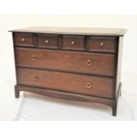 STAG MAHOGANY CHEST with a moulded top above four frieze and two long panelled drawers, standing