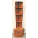 G PLAN TEAK NARROW CORNER UNIT with a curved plain top above three shelves, the shaped base with a