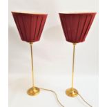 PAIR OF BRASS TABLE LAMPS raised on circular bases with narrow columns and faux drip pans, each with