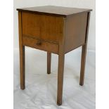 MAHOGANY SEWING TABLE with a square lift up lid revealing a pink satin lined interior, standing on