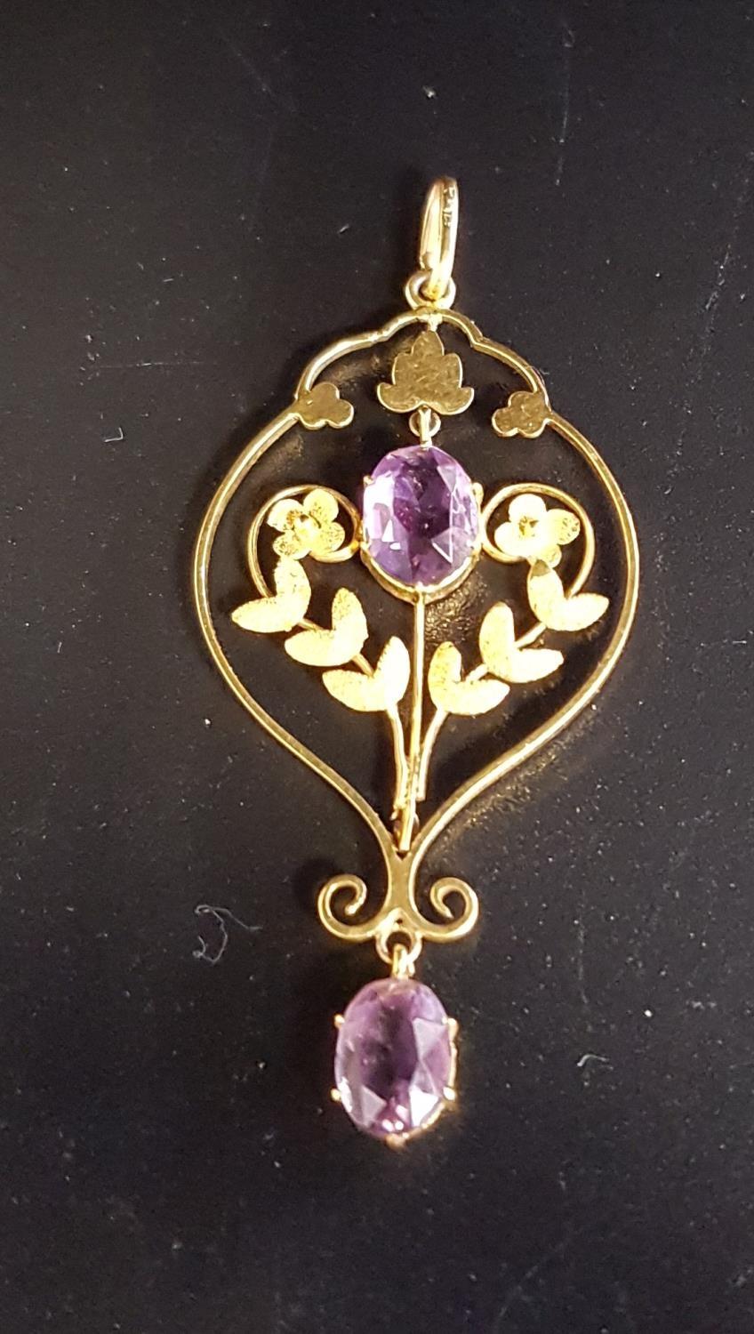 AMETHYST SET HOLBEIN PENDANT in nine carat gold