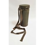 WWII GERMAN GAS MASK CANISTER of ribbed construction with shoulder strap, 28cm high