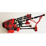 SET OF ROBERT REID OF GLASGOW BAGPIPES with ebonised turned wood pipes with white metal and