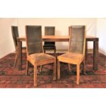 LARGE TEAK DINING TABLE AND CHAIRS the table with an oblong plank top, standing on plain supports,