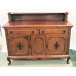 MAHOGANY SIDEBOARD with a raised back with a shelf above a moulded top with two panelled drawers