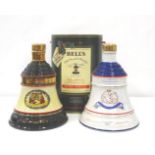 TWO COMMEMORATIVE BELL'S DECANTERS A pair of Bell's decanters, one Christmas 1988 decanter (75cl/