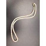 PEARL NECKLACE with nine carat gold clasp, 41cm long