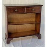 MAHOGANY SIDE CABINET with a rectangular top above two frieze drawers, with two shelves below,