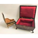 YEW AND INLAID JEWELLERY BOX with a lift up lid revealing a satin lined interior, raised on gilt
