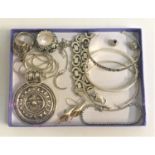 SELECTION OF SILVER JEWELLERY including a skull ring with red glass eyes, top hat and pipe; three