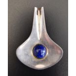 AKSEL HOLMSEN NORWEGIAN SILVER PENDANT set with a round cabochon lapis lazuli to the centre of the