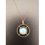 PRETTY MOONSTONE PENDANT the central round cabochon moonstone in pierced unmarked gold mount, on