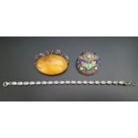 AQUAMARINE LINE BRACELET in silver; together with an enamel decorated silver brooch with butterfly