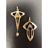 TWO SECESSIONIST STYLE FOURTEEN CARAT GOLD PENDANTS both set with blue topaz and one with pearl