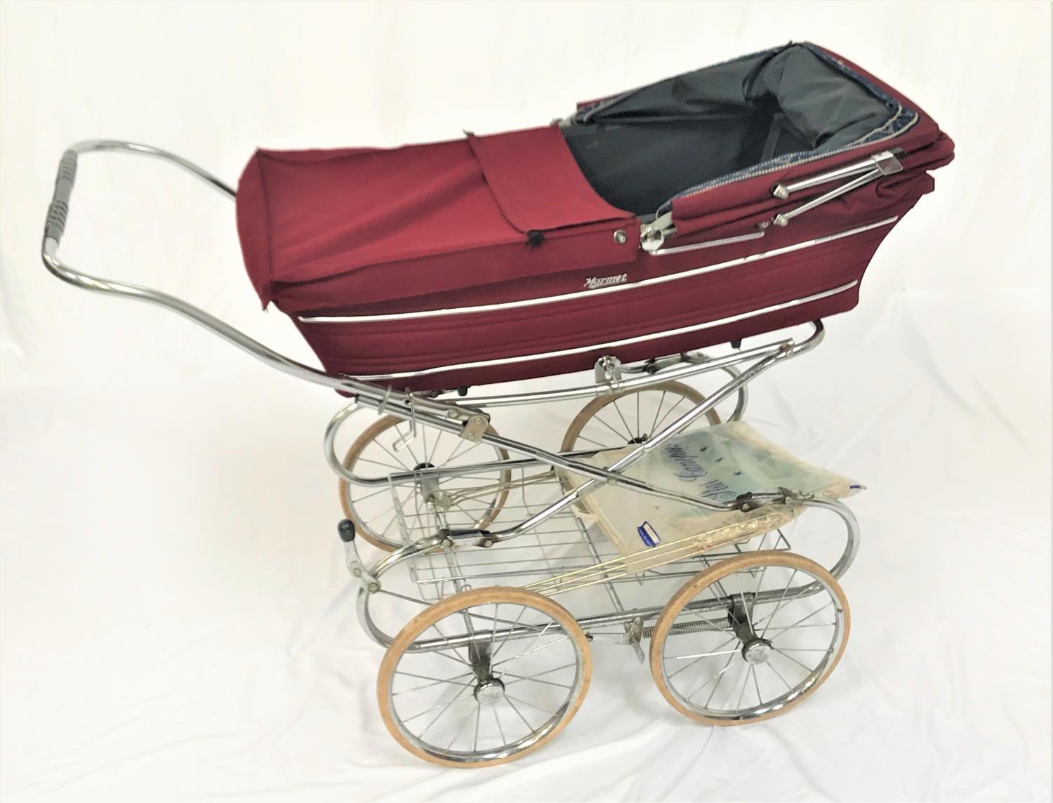 MARMET PRAM with a burgundy body with rain cover and folding hood on a four wheel chrome folding