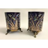 PAIR OF COBALT BLUE GLASS VASES of tubular form, decorated with birds and foliage, raised on gilt