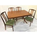 TEAK DRAWLEAF DINNING TABLE standing on shaped columns with splayed supports united by a