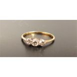 GRADUATED DIAMOND THREE STONE RING the diamonds totaling approximately 0.35cts, on unmarked gold