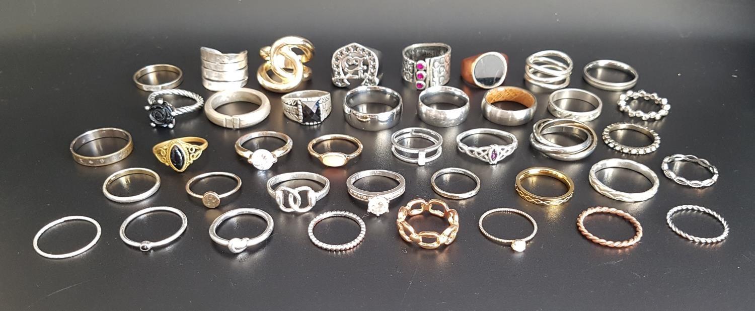 SELECTION OF SILVER AND OTHER RINGS of various sizes and designs, including gem and stone set