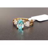 CERTIFIED BLUE AND WHITE ZIRCON RING the central Ratanakiri blue zircon weighing 1.97cts flanked