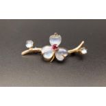 PRETTY MOONSTON AND RUBY BROOCH the central three moonstones in the form of a three leaf clover,