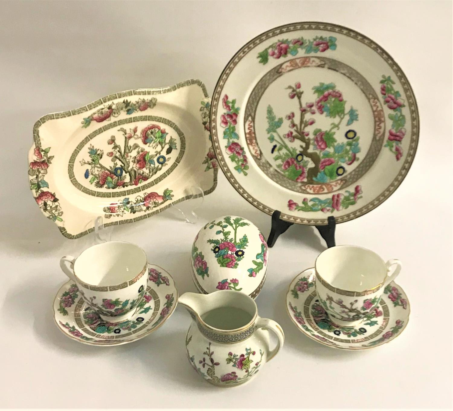 HARLEQUIN PART DINNER SERVICE decorated in the Indian Tree pattern and comprising eight soup