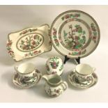 HARLEQUIN PART DINNER SERVICE decorated in the Indian Tree pattern and comprising eight soup