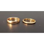 TWO NINE CARAT GOLD WEDDING BANDS one with scroll decoration to the sides, sizes, M-N and I, total