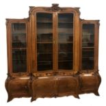 LOUIS XV STYLE FRENCH WALNUT LIBRARY BOOKCASE circa 1900, carved overall with flowers and scrolls,