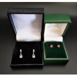 TWO PAIRS OF GEM SET EARRINGS comprising a pair of aquamarine drop earrings in nine carat white