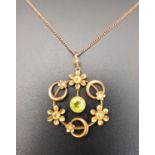 UNUSUAL EDWARDIAN PERIDOT AND SEED PEARL PENDANT the outer ring set with alternating peridots and