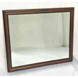 LARGE RECTANGULAR WALL MIRROR in an oak frame with a bevelled plate, 107cm x 129.5cm