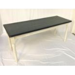FARMHOUSE STYLE KITCHEN TABLE with a black painted plank top, standing on white painted turned