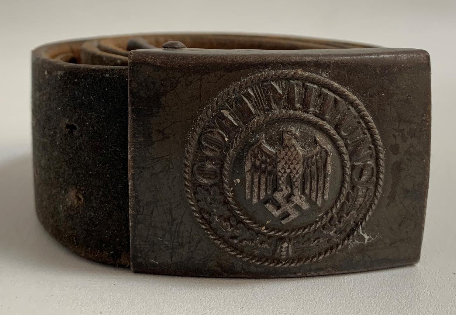 WWII GERMAN NAZI BELT the metal buckle marked Gott Mit Uns above the German eagle and swastika, on a