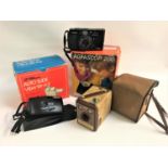 SELECTION OF THREE CAMERAS including a Kodak browning flash b, Canon AF35M, Panorama wide pie,