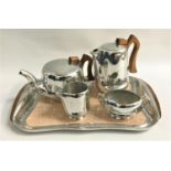 PICQUOT WARE TEA SERVICE comprising a tea pot, hot water jug, milk jug, oval sugar bowl and tray (5)