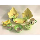 SELECTION OF CARLTON WARE including a lidded preserve pot, two leaf shaped dishes, shaped cabbage