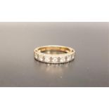 DIAMOND HALF ETERNITY RING the seven diamonds totaling approximately 0.25cts, in nine carat gold,