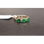 CERTIFIED EMERALD AND DIAMOND RING the three round cut Luhlaza emeralds totaling 1.05cts separated