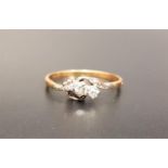 DIAMOND THREE STONE TWIST DESIGN RING the diamonds totaling approximately 0.2cts, on gold shank (