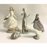 FIVE LLADRO FIGURINES comprising Cinderella, 25cm high, girl feeding a goose, 23.5cm high, girl in a