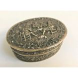DUTCH SILVER TRINKET BOX the hinged oval box with profuse figure and scroll decoration overall,