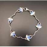 SHIELA FLEET ENAMEL DECORATED 'SUMMER SPLASH' BRACELET the six enamelled links separated from the