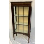 1930s MAHOGANY DISPLAY CABINET with a moulded top above a glass panel door and sides, the interior