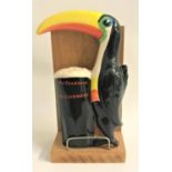 CARLTON WARE GUINNESS SAVERTISING TOUCAN with a pint of Guinness, 18.5cm high, together with a later